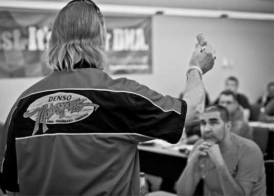 Technician learning automotive service